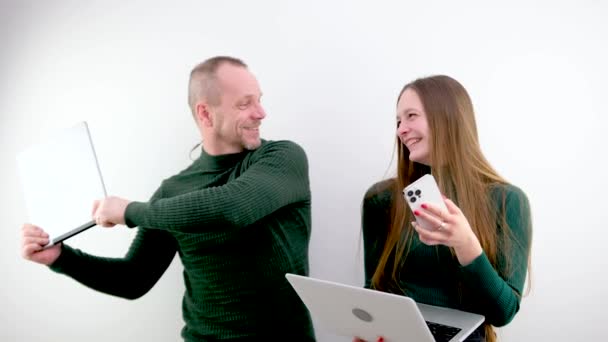 Man Woman Fighting Using Laptop Tablet Phone Technology Laugh Play — стокове відео