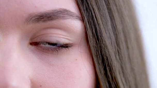 Young Beautiful Caucasian Ukrainian Woman Opens Blue Eyes Close Macro — Stock Video