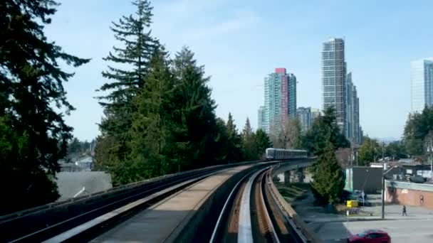Train Traveling Road Another Skytrain Coming Front Window Driverless Subway — Vídeo de stock