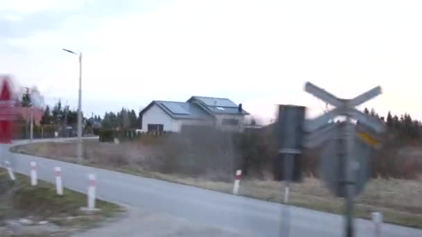 Train Passes Countryside Towns Small Houses Spring Empty Bare Trees — Stock Video