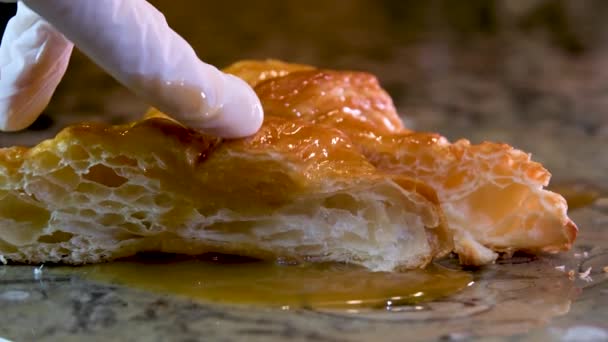 Appetizing Porous Structure Croissant Cut Section Sleeve Glove Presses Dough — Stock Video