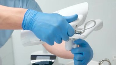 Beyond Poluse advanced whitening system with dental UV laser whitening device camera floats down filming teeth whitening system lamp glows blue latest dentistry technology doctor no people treatment