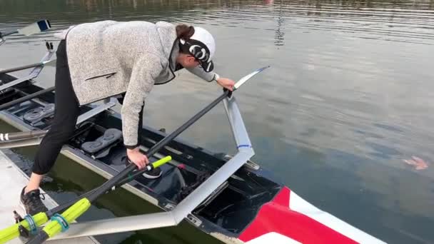 Girl Preparing Swim Boat Rowing She Screwing Autumn Water Sports — Stock Video