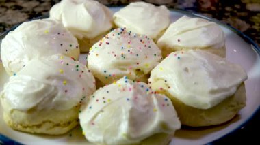Easter cake is decorated with colored sprinkles. Pussy willow on a brown background, Easter and recipes, home cooking and celebration, recipe, baking. High quality 4k footage