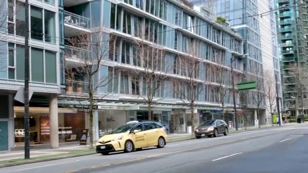 Vancouver Street Skyscrapers Blooming Sakura Spring Cars Different Buildings Road — Stock Video