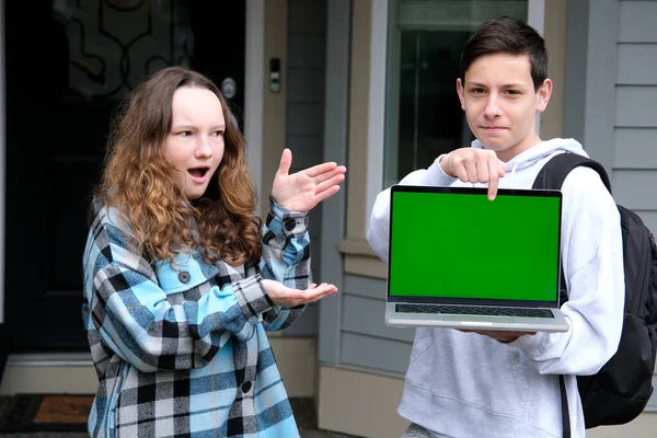 Surprise Indignation Boy Teenage Girl Point Laptop Green Screen Chromakey — Stock Photo, Image