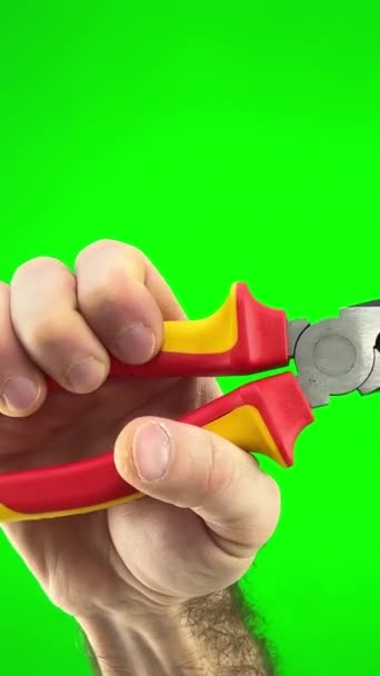 Pliers Red Yellow Handle Green Chromakey Background Hands Man Necessary — 비디오