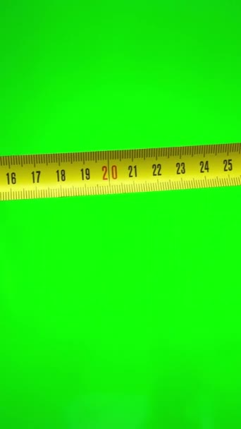 Female Hands Frame Green Chromakey Background Measured Yellow Centimeter Top — Stockvideo