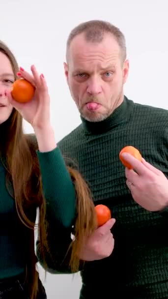 Young Girl Put Tangerines Eyes Pulled Out Tongue Stuck Out — Stock Video