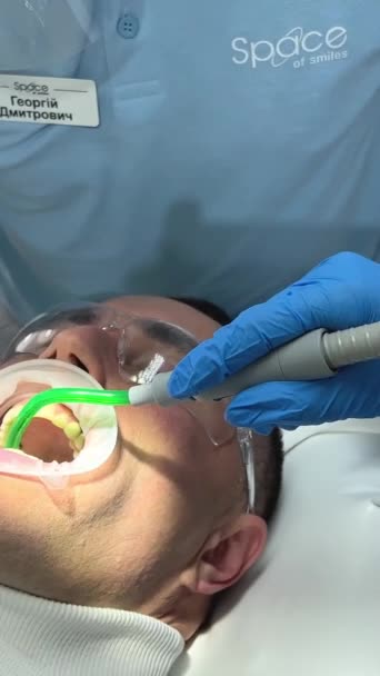 Man Dentist Has Tooth Treated Cleaning Polishing Teeth Close Dental — Video