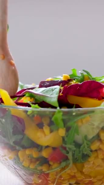 Wooden Spoons Stir Salad Glass Plate Corn Tomatoes Cucumbers Bulgarian — Videoclip de stoc