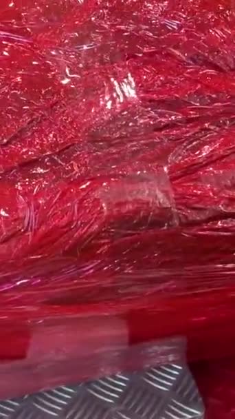 Baggage Wrapping Point Red Plastic Film Surrounds Blue Green Suitcase — Stock Video