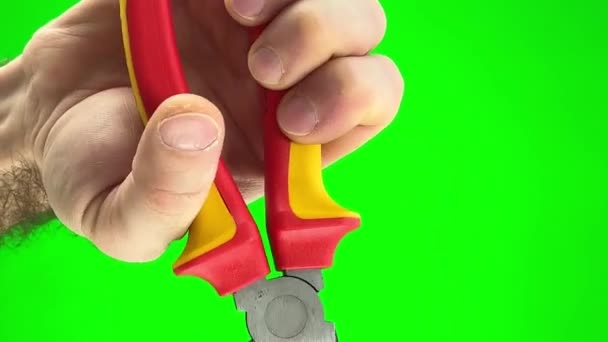 Pliers Red Yellow Handle Green Chromakey Background Hands Man Necessary — Vídeo de Stock