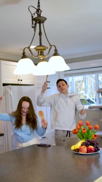 Overjoyed Young Caucasian Couple Dancing Singing Preparing Healthy Food Together — Stock Video
