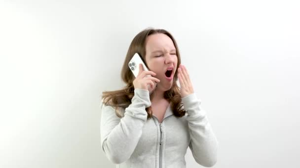 Yawn While Talking Phone Unpleasant Boring Conversation Young Girl Covers — Stock Video
