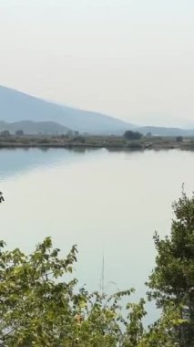 Butrint, Sarande İlçesi Arnavutluk Sinematik Roma Baptisterisi, Antik UNESCO Dünya Mirasları Merkezi 4K Arnavutluk, Butrint. Eski bir Buthrotum kasabasının kalıntıları.