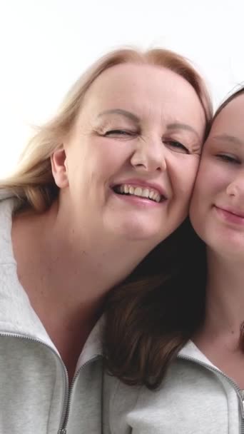Pretty Smiling Child Daughter Embrace Mom Look Camera Happy Beautiful — Stock Video