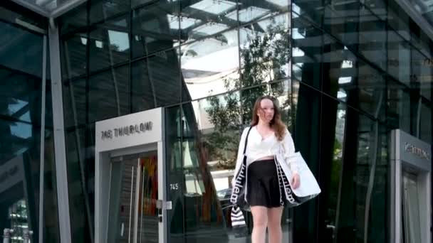 Young Beautiful Teenage Girl Walking Street Waterfront Lululemon Packages Light — Stock Video