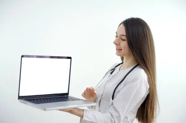 Smiling female doctor on smartphone screen giving a medical prescription online doctor video consultation concept. High quality photo