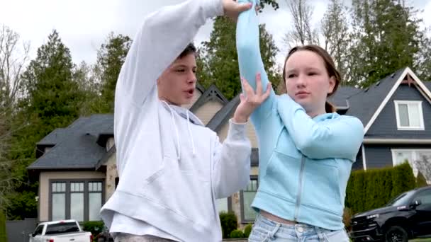 Bad Attitude Teenagers Fight Wring Girls Arm Abuser Boy Girl — Stock Video