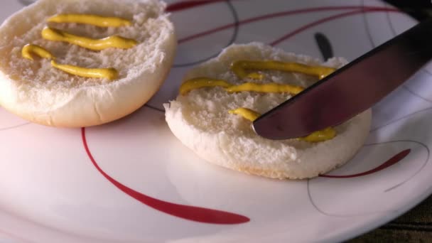 Making Burger Spreading Mustard Sauce Half Grilled Burger Bun High — Stock Video
