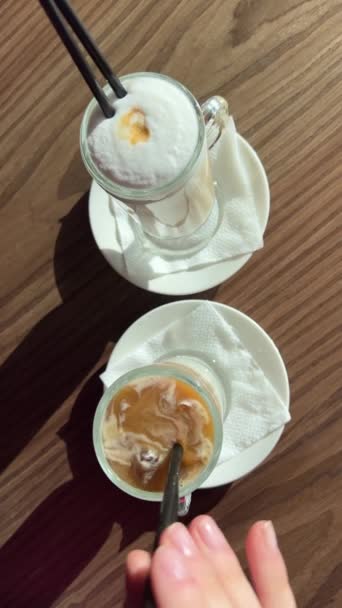 Waiter Serves Two Lattes Hot Cold Comparing Two Flavors Ice — Stock Video