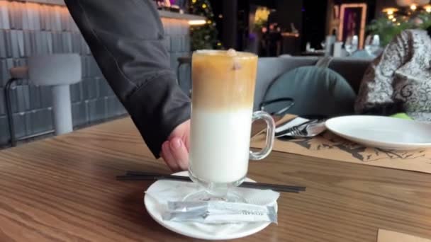Waiter Serves Two Lattes Hot Cold Comparing Two Flavors Ice — Stock Video