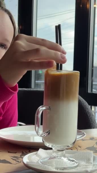 Winter Girl Takes Pictures Drinks Takes Glass Ice Latte Restaurant — Stock Video