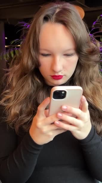 Girl Phone Restaurant Woman Using Smartphone Device Positive Hispanic Millennial — Stock Video
