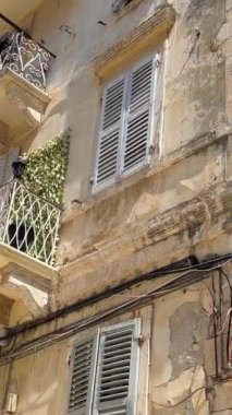 Greece Corfu island stroll through the streets attractions old ancient houses statues road life in city. tourism travel