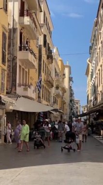 Greece Corfu island stroll through the streets attractions old ancient houses statues road life in city. tourism travel