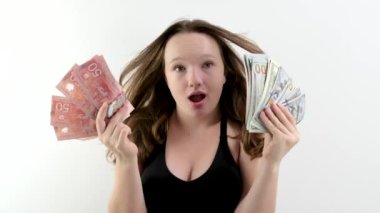 Kanada parası sayan kişi. Kanada Doları Amerikan Doları