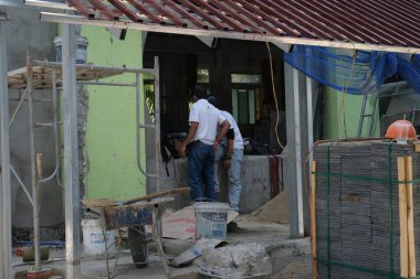 İnsanlar kafe inşaatı için Vietnam Ho Chi Minh Şehri 08.04.2025