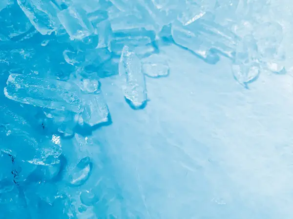 stock image icecubes background,icecubes texture,icecubes wallpaper,ice helps to feel refreshed and cool water from the icecubes helps the water refresh your life and feel good.ice drinks for refreshment business