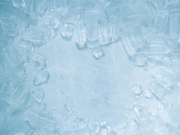 stock image icecubes background,icecubes texture,icecubes wallpaper,ice helps to feel refreshed and cool water from the icecubes helps the water refresh your life and feel good.ice drinks for refreshment business