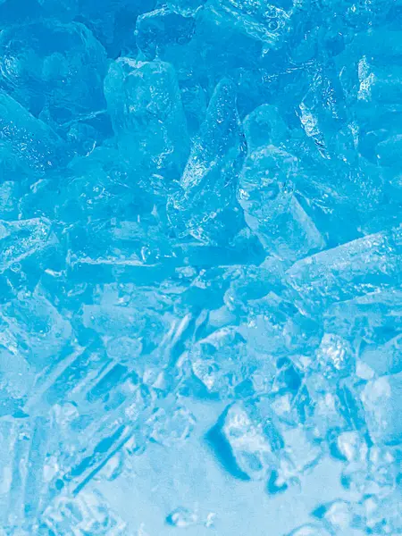 stock image icecubes background,icecubes texture,icecubes wallpaper,ice helps to feel refreshed and cool water from the icecubes helps the water refresh your life and feel good.ice drinks for refreshment business