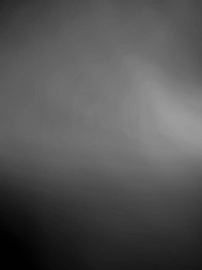 Siyah ve gri eğimli bir arkaplan. Siyah ve gri kömür gradyan. Koyu ve gri soyut duvar kağıdı. Siyah ve koyu renk gradyan parlak arkaplan çizimi.