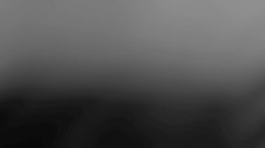 Siyah ve gri eğimli bir arkaplan. Siyah ve gri kömür gradyan. Koyu ve gri soyut duvar kağıdı. Siyah ve koyu renk gradyan parlak arkaplan çizimi.