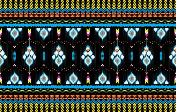 stock image tribal ethnic themes geometric seamless background with a Peruvian american indigenous pattern. Textile print with rich native American tribal themes in an ethnic traditional style. Clothing with Navajo emblems.