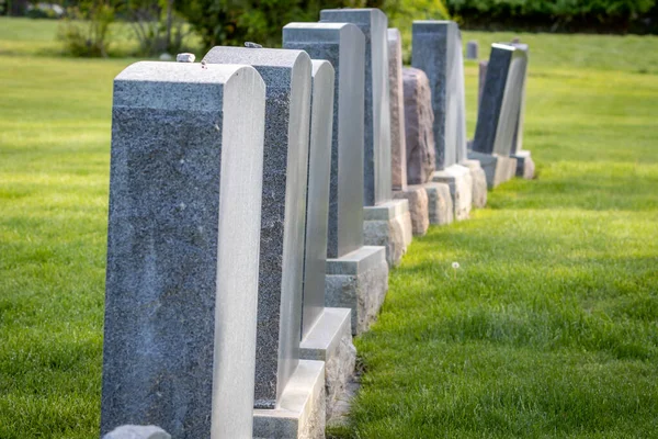 stock image A row of stone grave markers at a cemetery