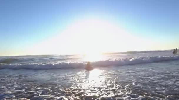 Girl Riding Boogie Board Ocean Waves — Stock Video