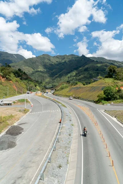 stock image Natural landscape with hill and blue sky on the road via the sea. Colombia.