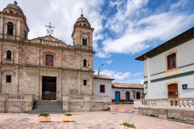 Nemocon, Cundinamarca, Colombia. July 2, 2021: Facade of San Francisco de Ass church and blue sky.