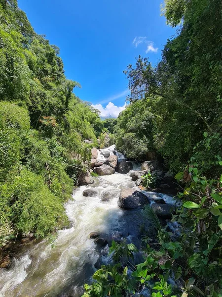 stock image Landscape of the Cartama river with blue sky. Stones in the river. Tamesis, Antioquia, Colombia. 