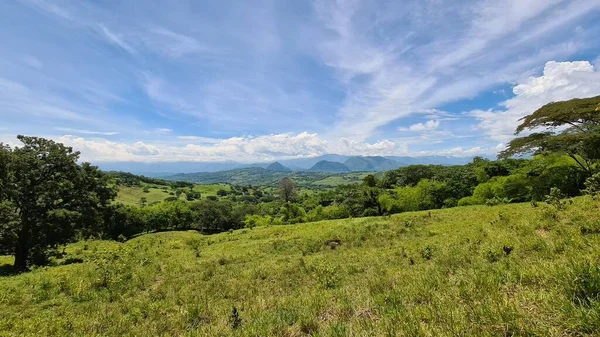 stock image Natural landscape with mountains on the horizon and blue sky. Tamesis, Colombia. 