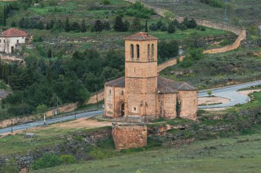 Segovia, Espaa. April 28, 2022: Church of the Vera Cruz and rural landscape in the background.