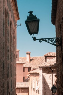 Toledo, Espaa. April 29, 2022: Streets and facades in the city of Toledo with blue sky.