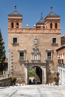 Toledo, Espaa. April 29, 2022: Domes and facade of city churches with blue sky.