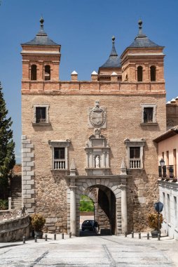 Toledo, Espaa. April 29, 2022: Domes and facade of city churches with blue sky.