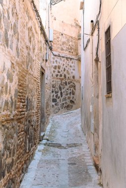 Toledo, Espaa. April 29, 2022: City alleys with facade of houses.